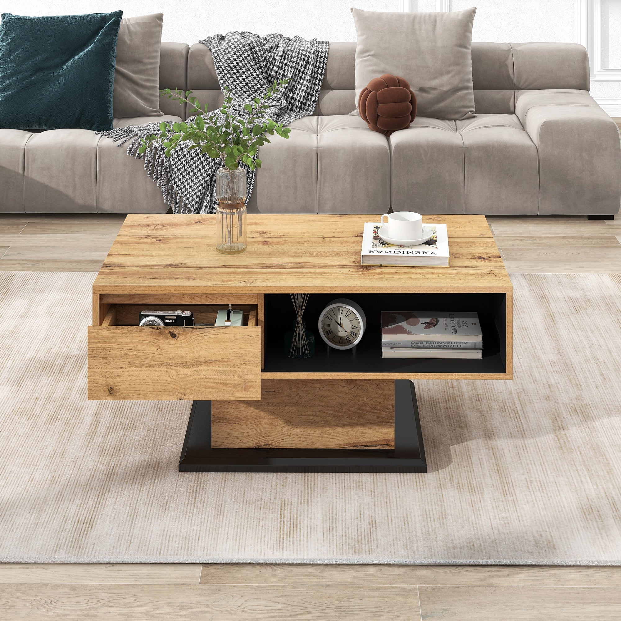 Wood grain coffee table with handleless drawer and double-sided storage