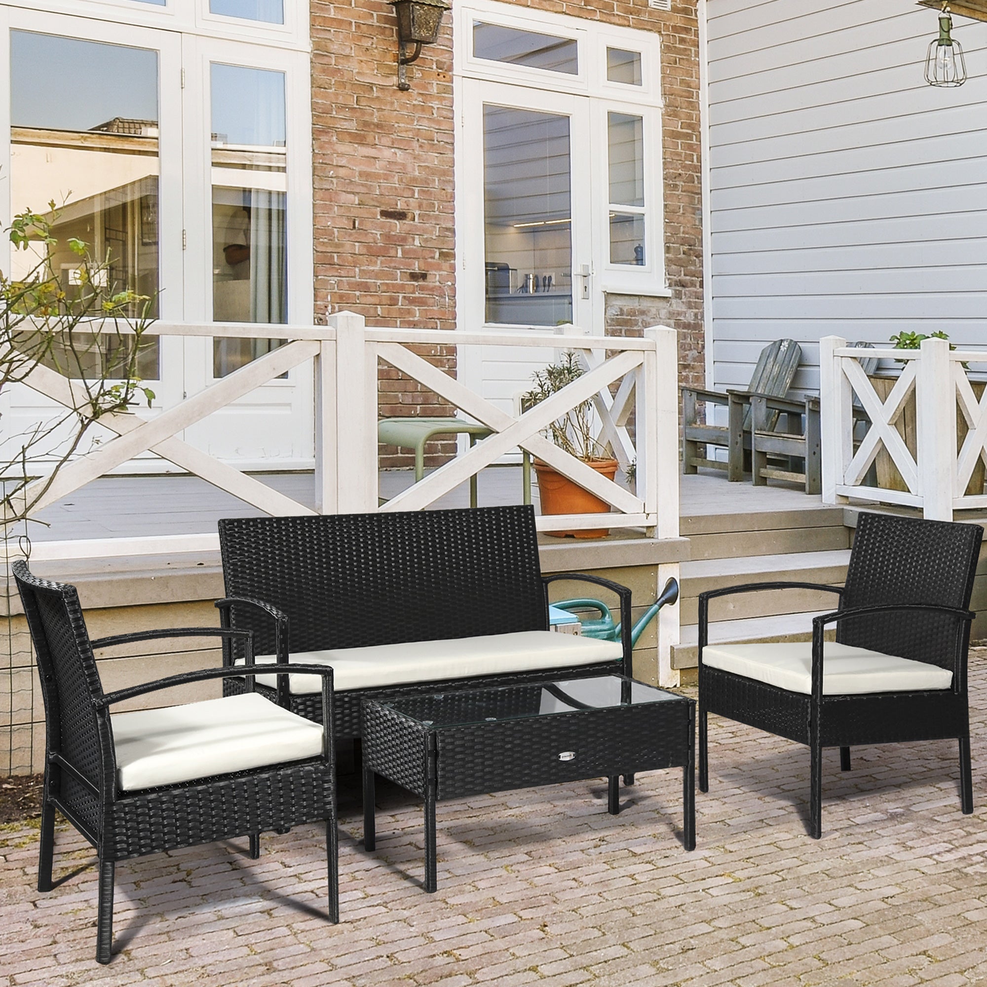 4-Piece Rattan Garden Sofa Set with Loveseat, Armchairs, Glass Table, Black Rattan