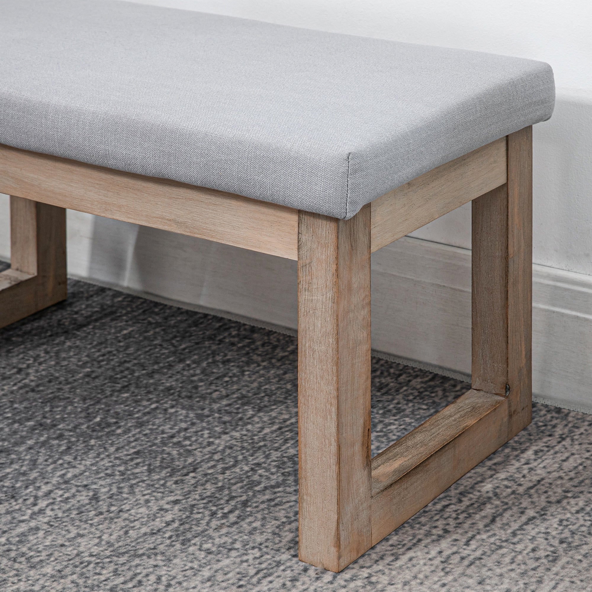 Footstool upholstered with wooden legs, 68x38x42 cm, grey