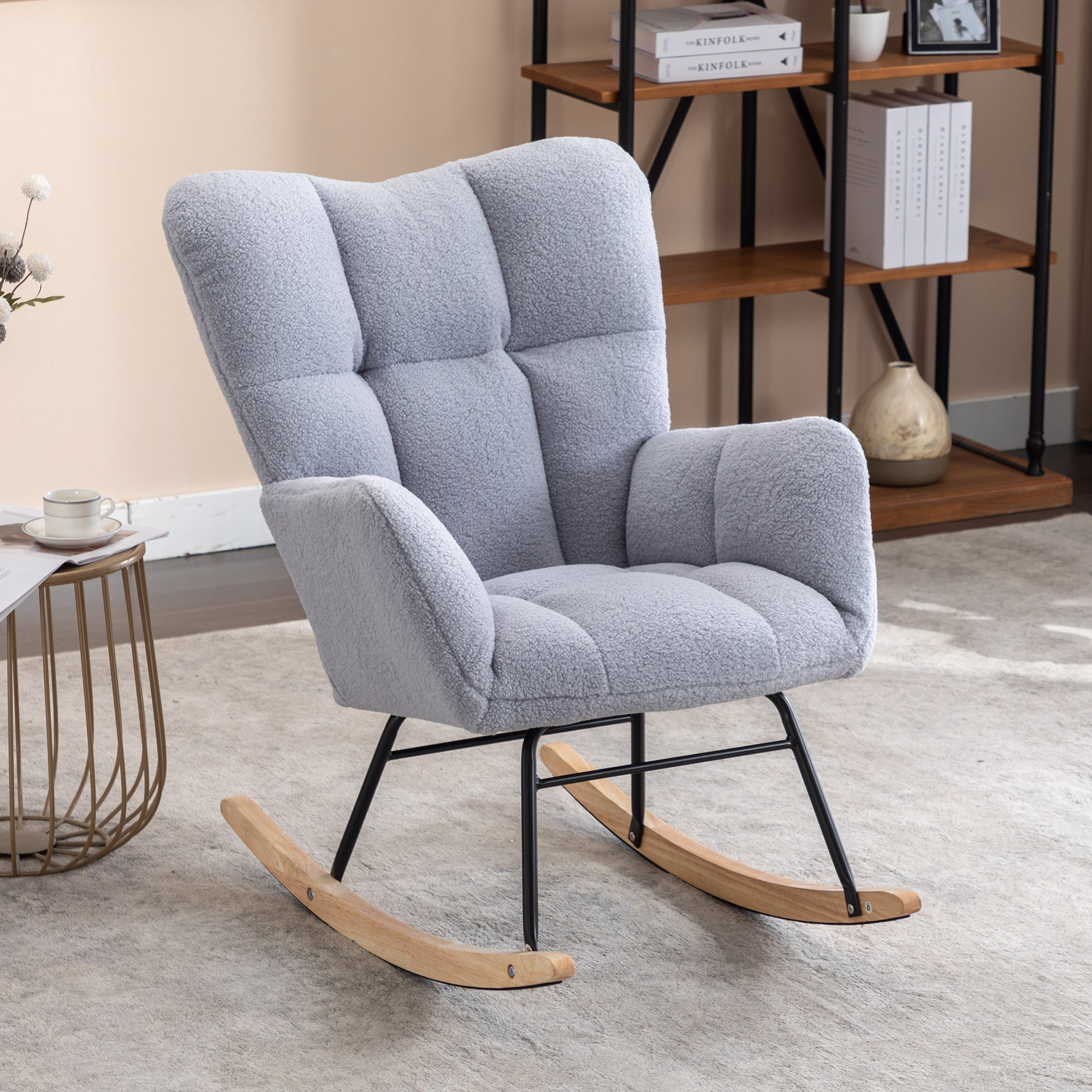 Mid century modern rocking chair with tufted cover and padded seat, light grey