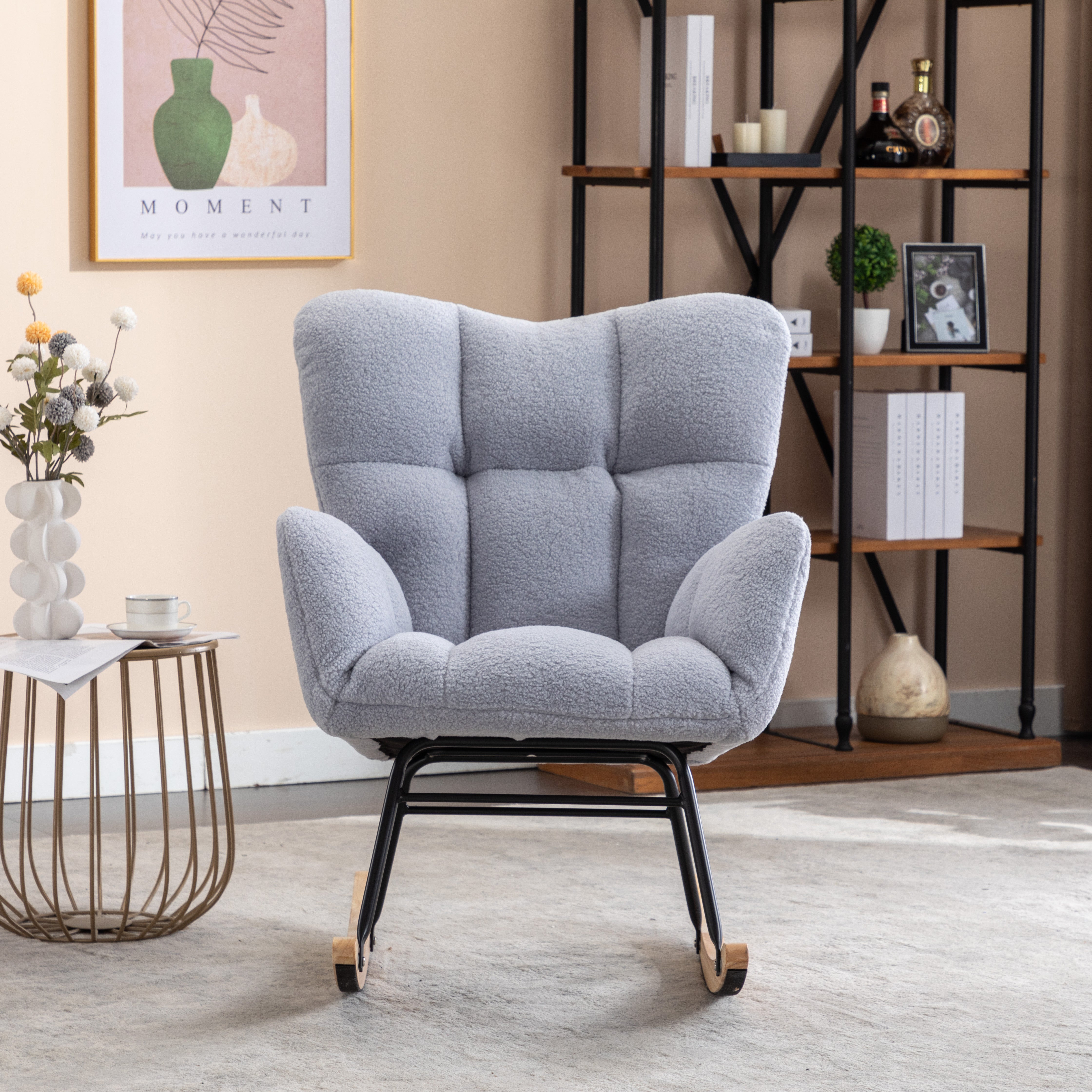 Mid century modern rocking chair with tufted cover and padded seat, light grey