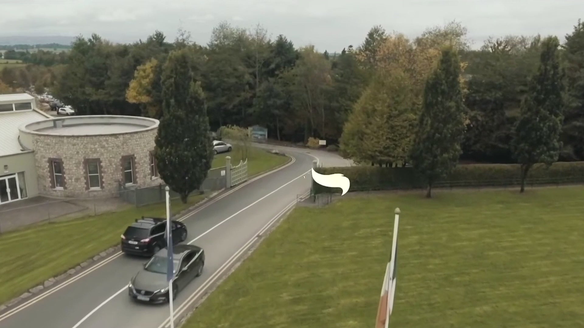 Load video: A family walks along a woodland trail through the trees at Rathwood's Foxes Park